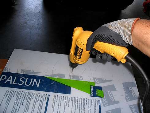 Drilling 1/8" holes in the center of the 1/4" thick Lexan (Polycarbonate) four 6.7" baffles onto - 4 (Click to go to page)
