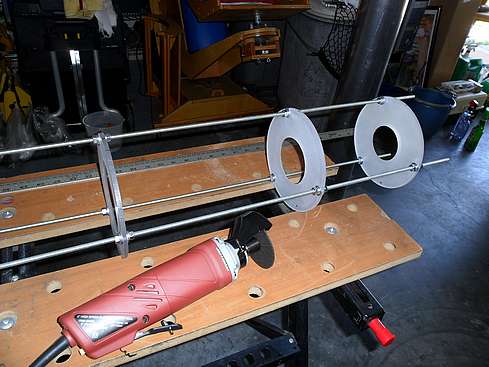 The completed baffle rack and cut-off tool that will be use to create the notches - 46 (Click to go to page)