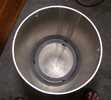 Positioning the first baffle inside of the main tube.