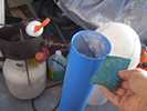 Buffing the tube in preparation for the clear coat finish.