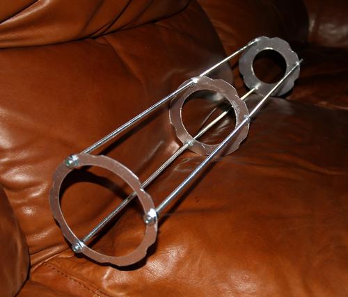 Baffles installed on the three threaded rods creating the baffle rack.