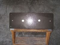 The top surface of the completed dovetail plate with the dovetail bar installed underneath.