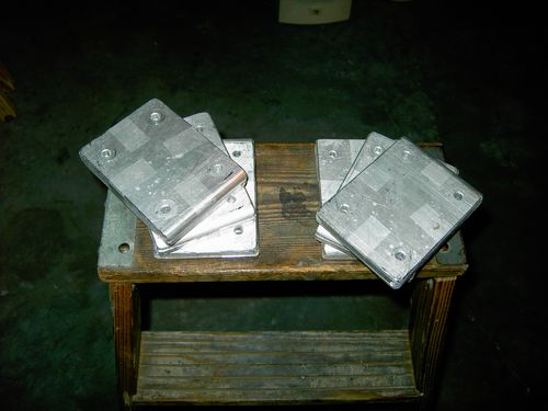 Cradle Ring Hinge Plates being cut out.